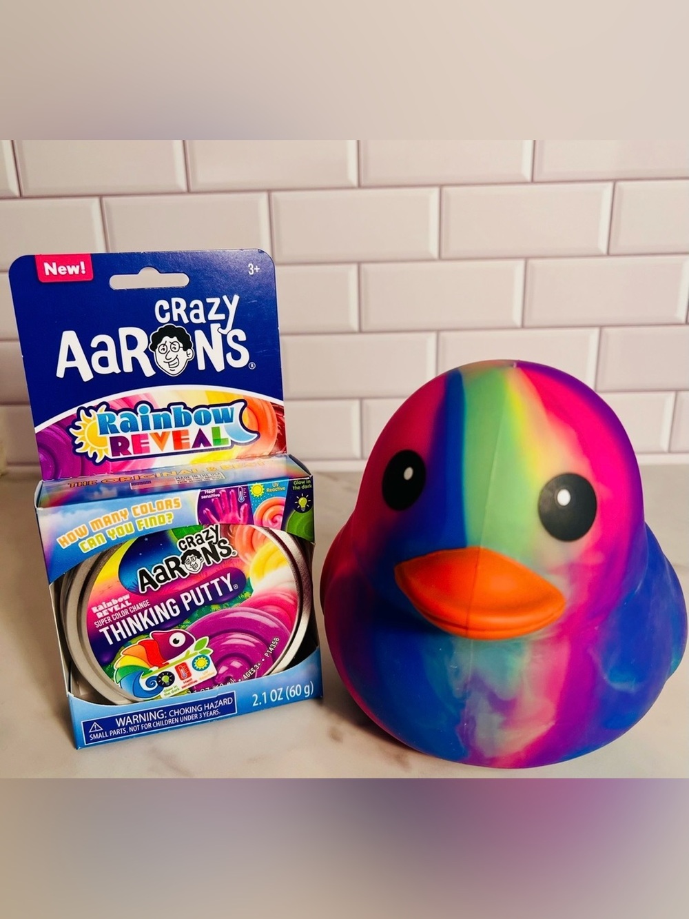 Crazy Aarons Rainbow Reveal Thinking Putty + Rainbow Jumbo Squishy Squeeezy Duck